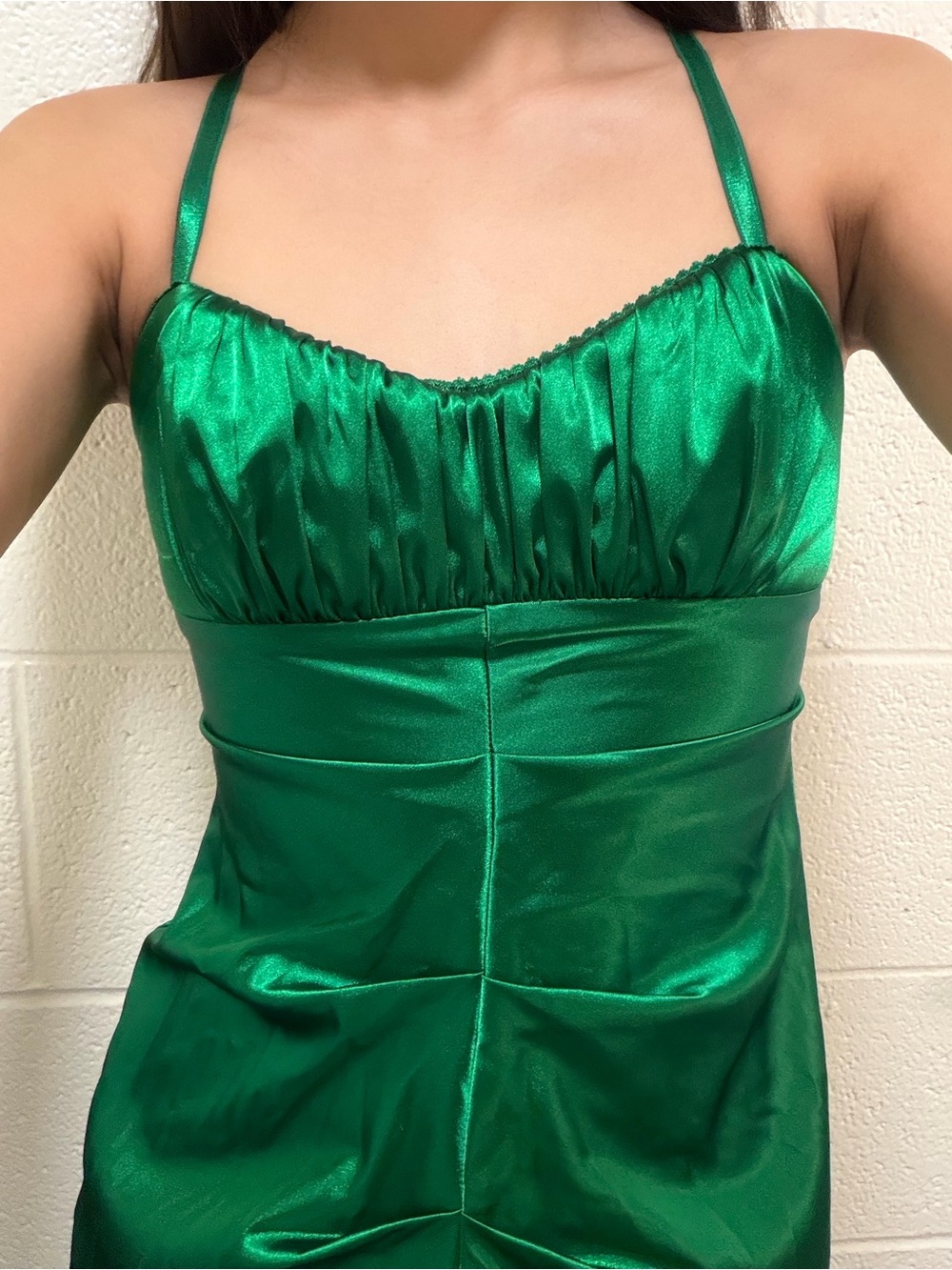 Green satin mini dress with ruched bust and adjustable straps
